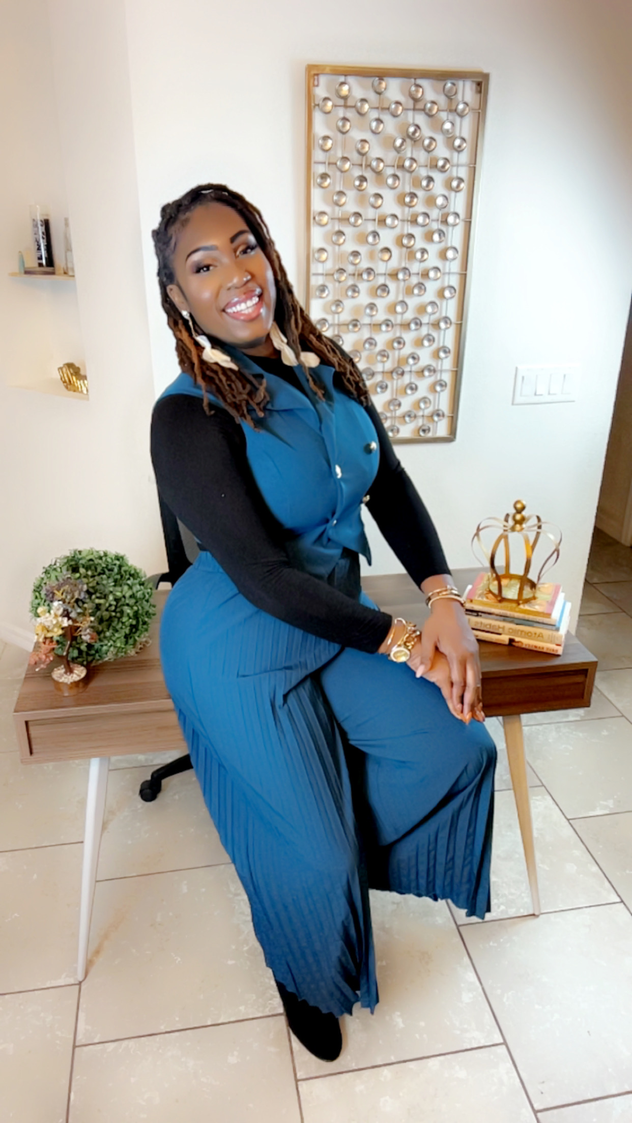 Nurse GeGe smiling in her office
